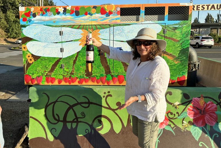 Pump Station Mural: Teresa officially christening the mural!